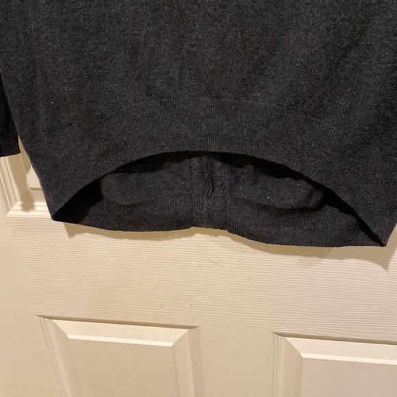 Dark Grey and pink uneven hem sweater. The back has a zipper sz. M - Picture 2 of 4